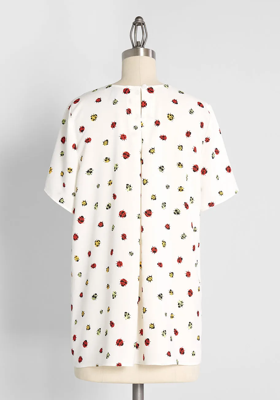 Exactly Effortless Hi Lo Blouse Ladybug Swarm Ivory