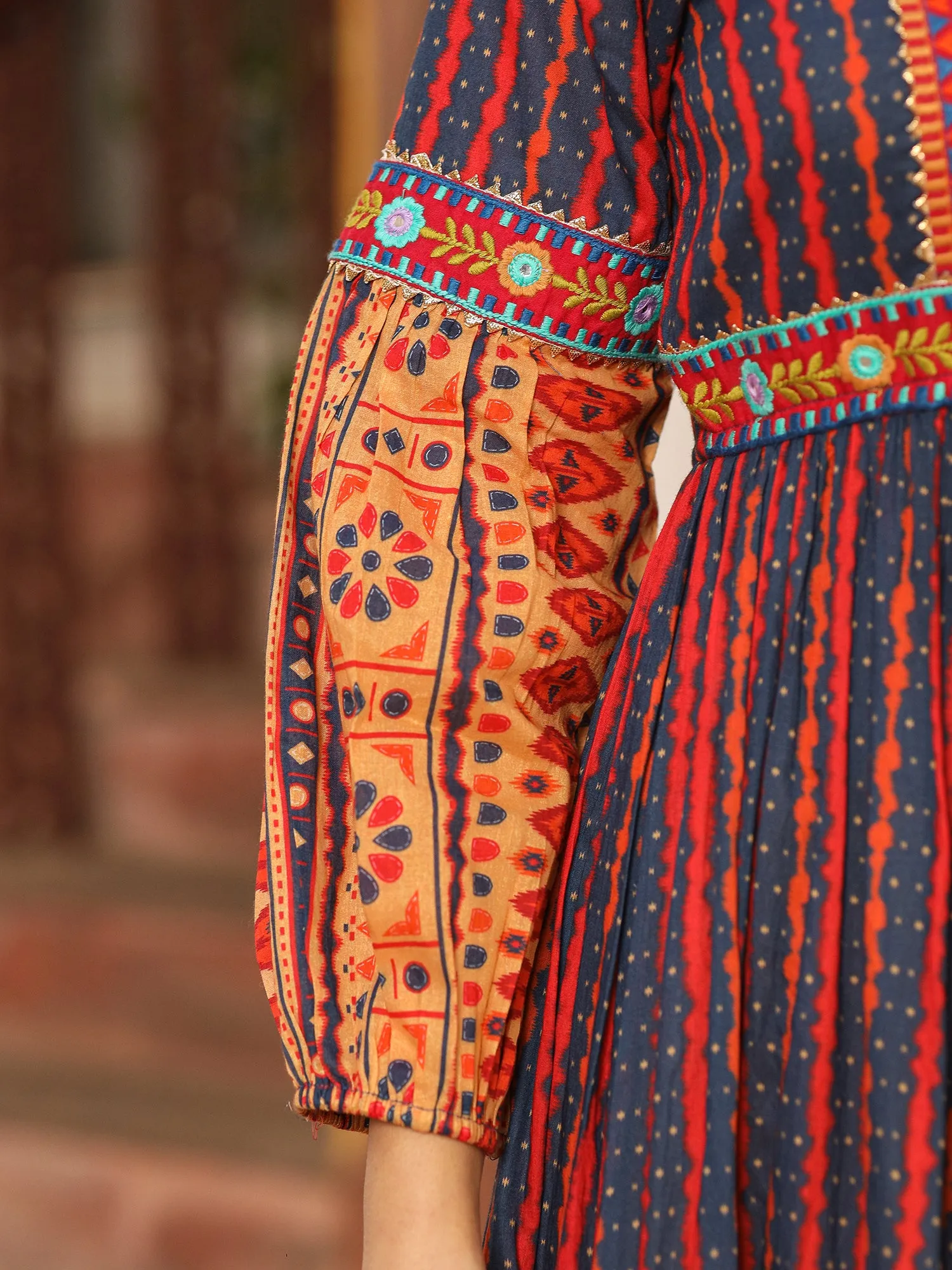 Juniper Rust Ikat Cotton Printed Tiered Maxi Dress With Thread Embroidery & Dori Tassel Tie-Up At Waist